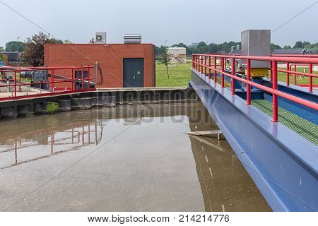 Dirty water in sedimentation tank of sewage treatment plant. In the first sedimentation tank is the primary clarification of the wastewater treatment process