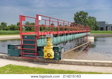 Waste water in secondary sedimentation tank of sewage treatment plant. This is the last step of the cleaning process with removing the last smaller particles.