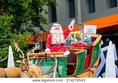 Adelaide Australia - November 18 2017: Santa greets the crowd of people during Adelaide's 85th Credit Union Christmas Pageant parade