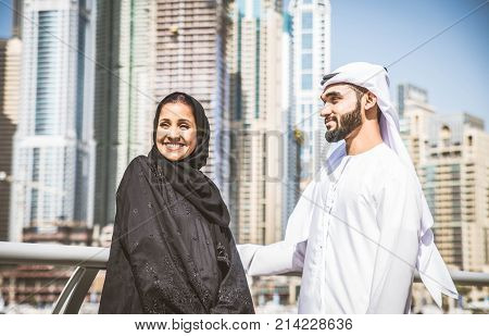 Arabic couple with traditional clothes dating outdoors
