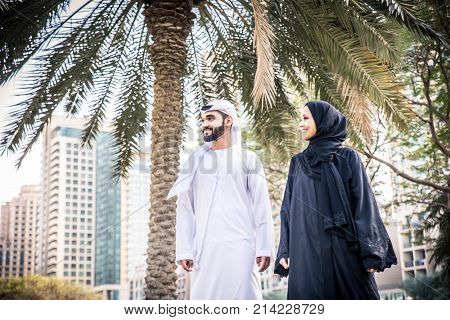 Arabic couple with traditional clothes dating outdoors