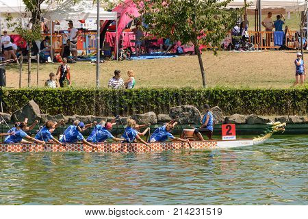 Rome Italy - July 30 2016: Dragon boat crews compete at the european championships held in Italy in 2016 summer in the photo the Italian crew