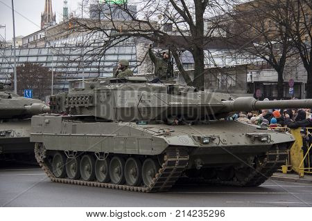 November 18, 2017. NATO tanks and soldiers at military parade in Riga, Latvia. solders take selfies with selfphone