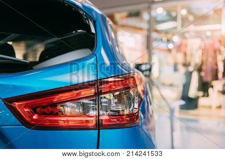Vilnius, Lithuania - September 21, 2017: Red LED Rear Lights Of Blue color compact crossover SUV Car Nissan Qashqai In Hall Of Shopping Center. Close Up Of Light