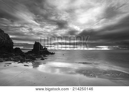 Stunning Black And White  Sunrise Landscape Image Of Barafundle Bay On Pembrokeshire Coast In Wales
