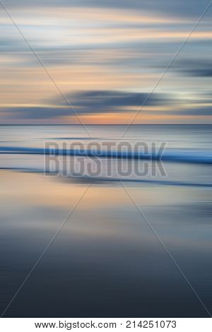 Beautiful Long Exposure Blur Sunrise Landsdcape Of Idyllic Broadhaven Bay Beach On Pembrokeshire Coa