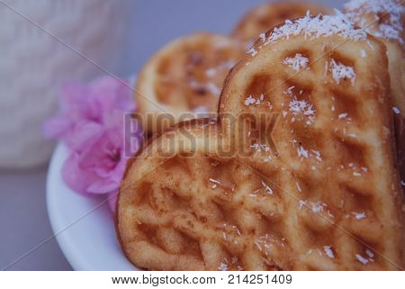 Belgian Waffles Heart with Pink Flowers. Food