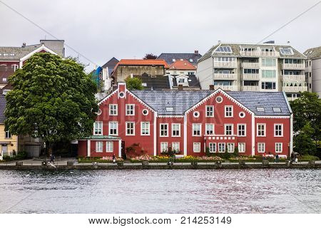 Red building near the Breiavatnet lake in Stavanger built from 1867 and finished in 1919
