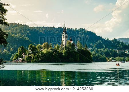 Colorful summer scene on the Bled lake with medieval castle Blejski grad. Slovenia, Europe.