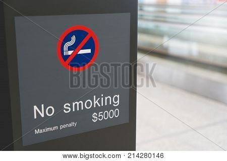 Airport no smoking area sign. Close-up of no smoking warning over airport or publick area background with copy space for text. Stop smoking concept.