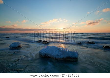 On the shore of the Caspian Sea. Caspian Sea in Kazakhstan.
The Caspian Sea is the largest enclosed inland body of water on Earth by area, variously classed as the world's largest lake or a full-fledged sea.