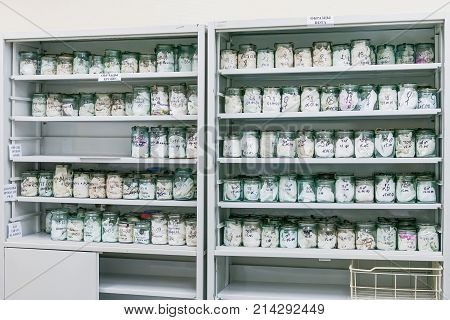 MOSCOW RUSSIA - June 24 2009. Glass jars with rags inside - samples of human blood and sweat. Shelves with material evidences in laboratory of examination human olfactory traces. Samples of deadbody's blood.