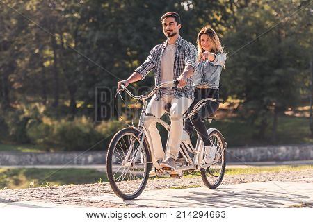 Couple With A Tandem Bicycle
