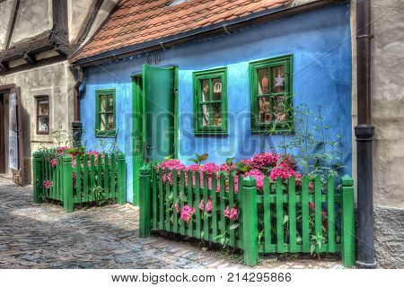 PRAGUE, CZECH REPUBLIC - JUNE 26, 2014: Golden Lane, Zlata Ulicka in czech, the street of small houses built in Mannerism style at the end of the 16th century, Prague castle, Czech Republic. Hdr image.
