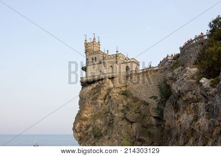 The famous castle 'Swallow's Nest' or 'Lastochkino Gnezdo' on a rock in the rays of the setting sun