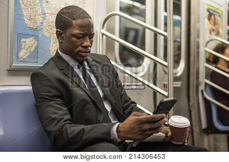 Businessman in full suit in New York subway metro