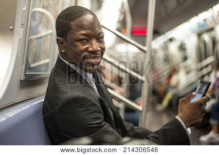 Businessman in full suit in New York subway metro