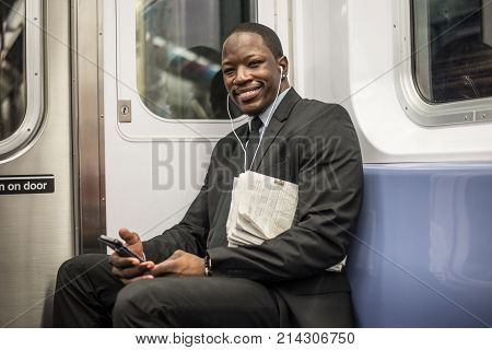 Businessman in full suit in New York subway metro