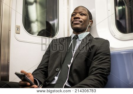 Businessman in full suit in New York subway metro