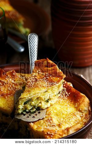 Cheese cake achma traditional Georgian pie . style rustic. selective focus