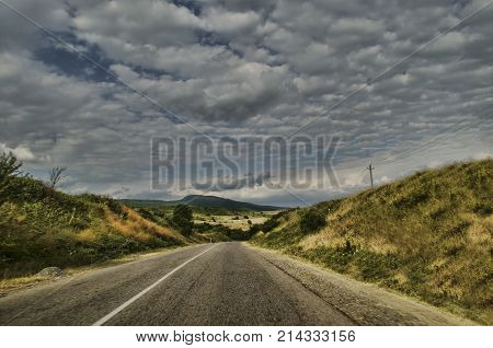 Cycling Mountain Road. Misty Mountain Road In High Mountains. Cloudy Sky With Mountain Road Of Azerb