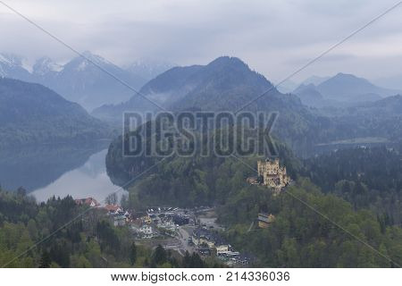 Beautiful view of the Hohenschwangau Castle and the Alpsee lake from the Neuschwanstein castle located near the city of Füssen, Munich