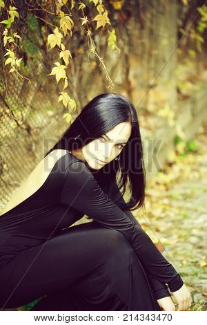 Woman Sitting Outdoor