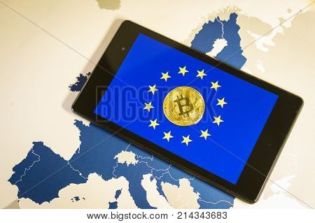 Financial Concept With Golden Bitcoin Over Smartphone, Eu Flag And Map.