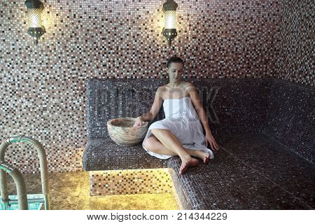 Woman Sitting In Hammam