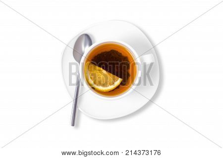 A cup of tea with lemon on a saucer on a white background isolation