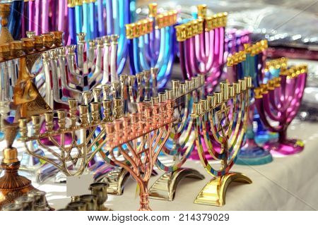 Menorah of Hanukkah (traditional candelabra) at the stand of a gift shop Netanya Israel. Jewish traditions and holidays.