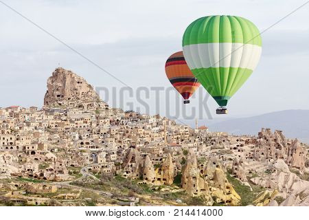 Balloons flight in the sunrise sky