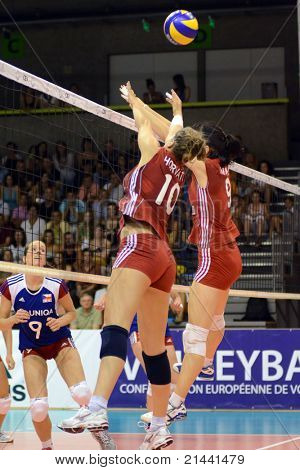 BUDAPEST, HUNGARY - JUNE 17: Dora Horvath (in red 10)  in action at a CEV European League woman's volleyball game Hungary vs Czech Republic on June 17, 2011 in Budapest, Hungary.