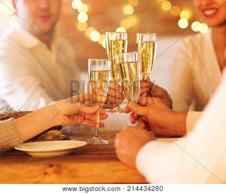 Champagne glasses in people hands. Party or celepration concept. Close up