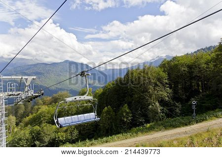 Pictureque landscape with empty funicular in green Caucasus mountains