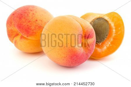 three apricot fruit isolated on white background cutout