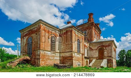 The destroyed brick temple of St. Mitrofan in Zura. Russia