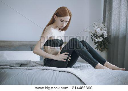 Young Girl Touching Skinny Body