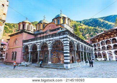 Rila, Bulgaria - October 27, 2017: Rila monastery view with autumn mountain trees at background
