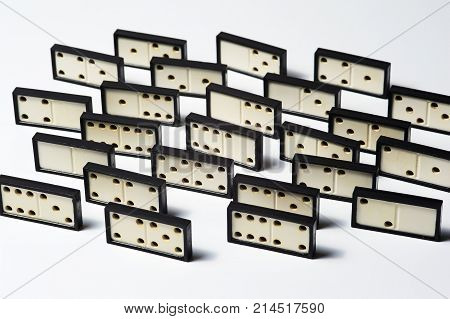 Domino pieces on wnite background closeup macro