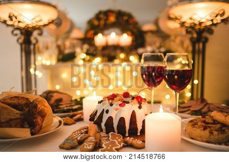 homemade cozy evening couple dessert concept. kitchen traditions. delicious holidays food and candles light