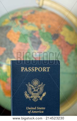 American travel document passport with world background.