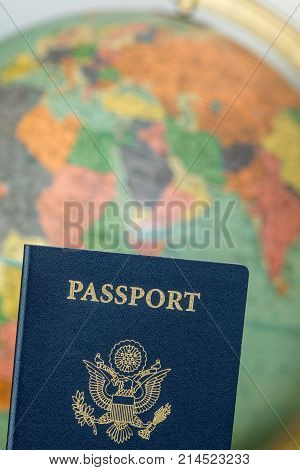 American travel document passport with world background.