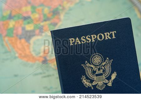 American travel document passport with world background.
