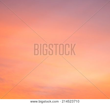 Dramatic sunset sky with warm colors in magenta orange yellow and pink