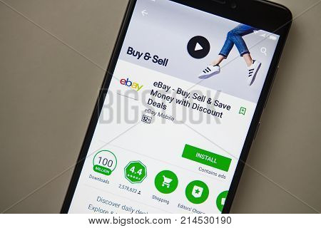 Berlin Germany - November 19 2017: ebay application on screen of modern smartphone close-up. Install menu of ebay app in Play Store. Shopping apps on display of phone