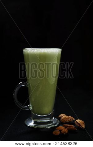 matcha latte with almond milk in glass
