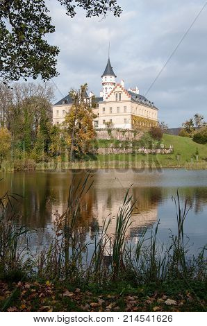Old and historic castle Radun in the mirror of the pond, Northern Moravia, Czech Republic