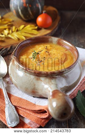 Vegetable pumpkin cream soup. Rustic style, autumn food