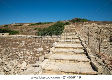 Steps up the hill to ancient Acropolis from Amathus archaelogical site Limassol Cyprus